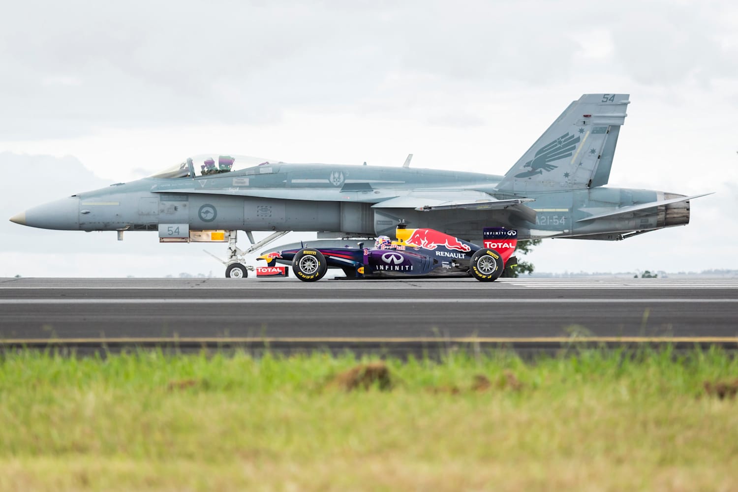 F1 Car Races Against An F A 18 Hornet Video