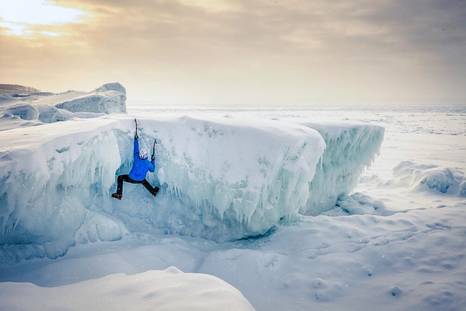 Winter ice climbing on the shores of Lake Michigan