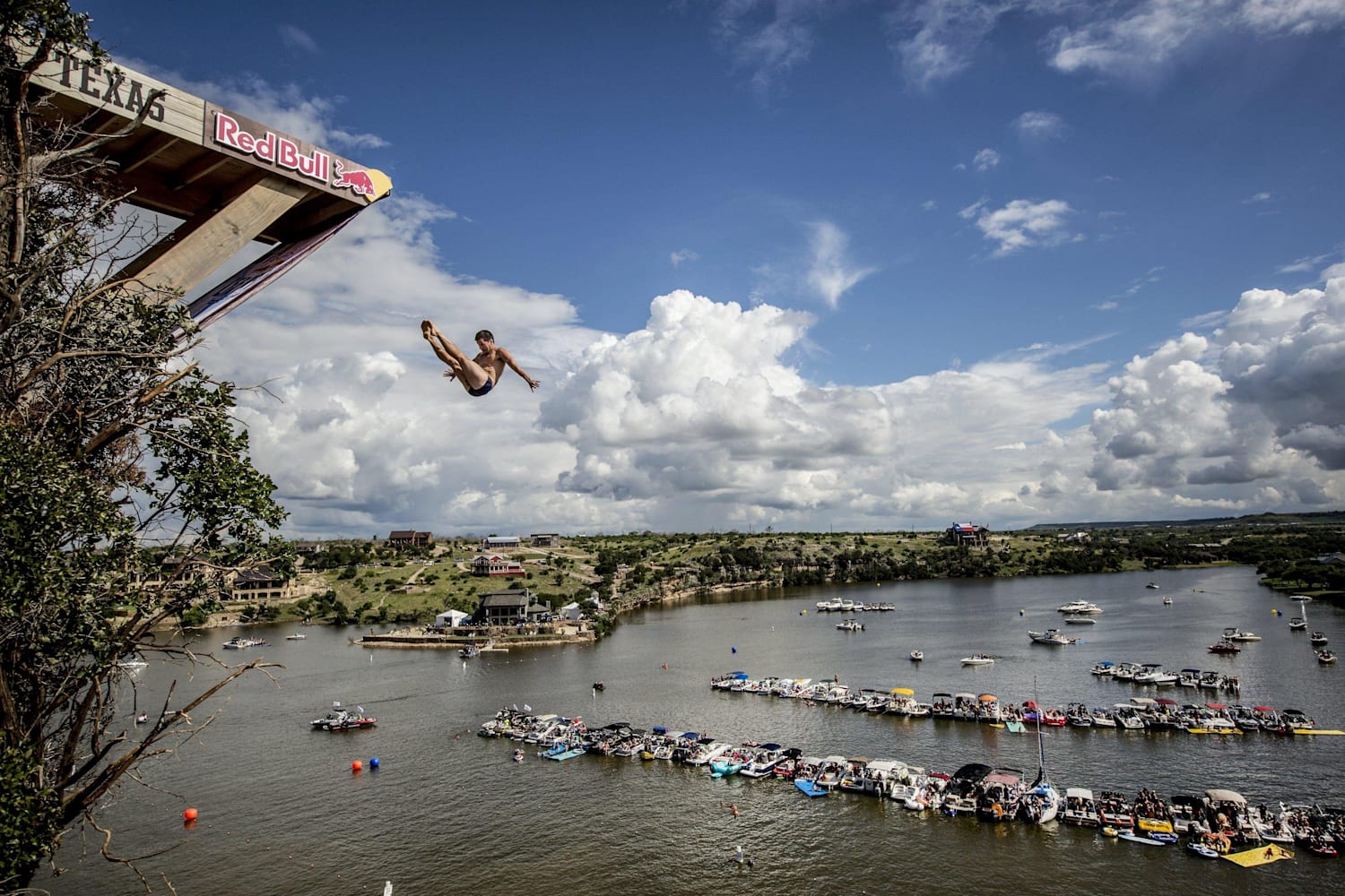 Possum Kingdom Lake Red Bull - David Colturi, from Los Angeles, twists his body after ... - Possum kingdom lake is a 20,000 acre reservoir known for its clear blue waters.