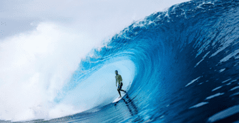 Surfer Michel Bourez rides the tube at Teahupo'o in Tahiti.