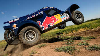 Carlos Sainz touches down for Dakar