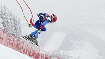 Didier Cuche races down the Streif during the Hahnenkamm downhill race in Kitzbuhel, Austria on January 21st, 2012