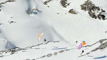 Dropping in from above during speedriding near Chamonix