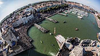 A huge crowd watches Gary Hunt dive to victory