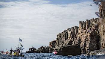 Gary Hunt performs a cliff dive in Shirahama