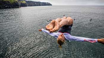 The reigning champion launches herself