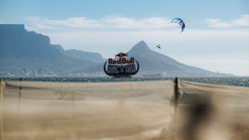 Leonardo Casati flies high in an epic kiteboarding display during Day 3 of Red Bull King Of The Air 2025, set against the iconic Cape Town skyline and mountains