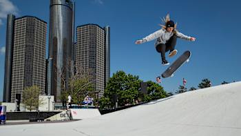 An image of a skateboarder in action at a skate park.