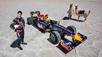 Daniel Ricciardo races the RB7 over salt flats