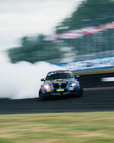 An image of a drift car in action at the Drift Masters European Championships.