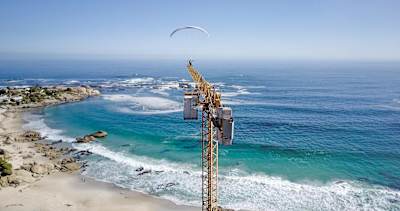 You can land anywhere with a paraglider, as flier Jean-Baptise Chandelier demonstrates.