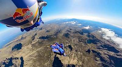 Wingsuit fliers Sebastian Alvarez and Dani Roman sail high above Mount Kenya during whispers of Mount Kenya on August 22, 2023.