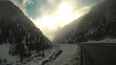 Sunset, snow and oncoming traffic