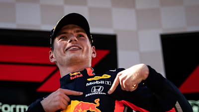 Max On The Austria Podium Pointing To Honda Badge