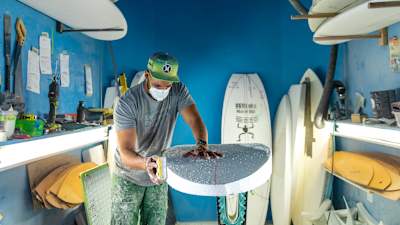 Ryan Harris building a surfboard