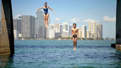 Juanpa training with Ellie Smart to attempt a 35-foot backflip