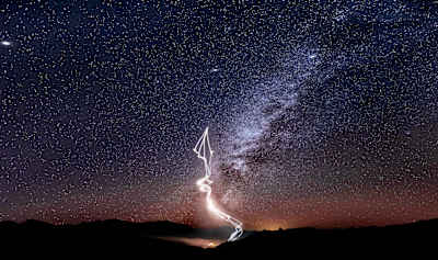 The Red Bull Air Force Team performs a nighttime wingsuit flight in front of a Milky Way backdrop, in Marfa, TX, USA on 15 November, 2020.