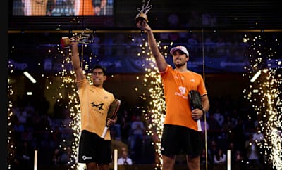 Federico Chingotto and Alejandro Galán lift their winner trophies during the 2026 Premier Padel Gijón P2 final ceremony in Gijón, Spain.