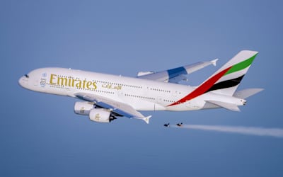 Just hanging out by a massive passenger plane