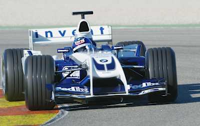 The 2004 Williams FW26 Formula One car in action.