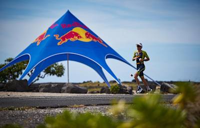 Sebastian Kienle running past the Energy Station