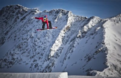 Anna Gasser jumps the kicker at the Glacier in Stubai Austria on November, 20th 2014.