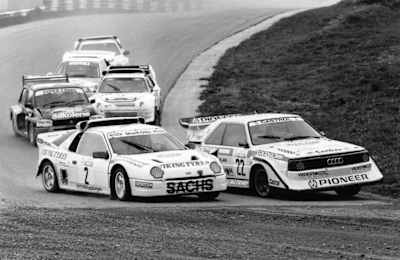 Drei Ford RS200 E2, ein Audi Sport quattro S1, ein MG Metro 6R4 und ein Peugeot 205 T16 E2 beim Rallycross-EM-Lauf 1989