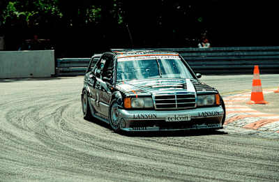 Klaus Ludwig, am Norisring, 1990 im Mercedes-Benz 190 Evolution II.