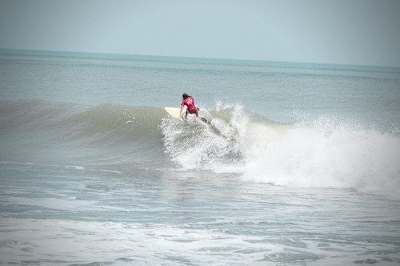 Indian surfer rips through during the Covelong Poi