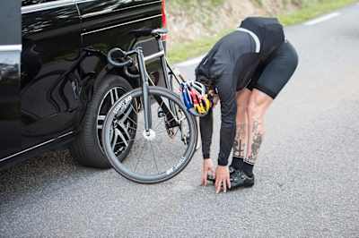 Fixed gear rider Patrick Seabase stretches during his #Seabase1910 ride to Bayonne