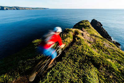 Colin Field rides on a knife-edge ridge.