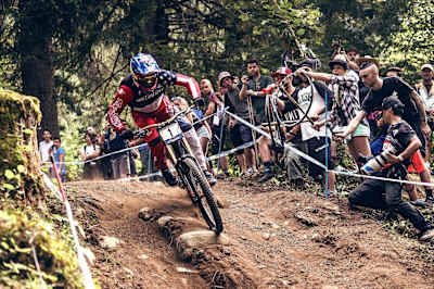 Aaron Gwin racing to victory at the Val di Sole UCI DH Mountain Bike World Cup, in Val di Sole, Italy on August 22, 2015