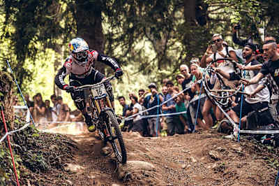 Brook Macdonald stomps down the Val di Sole DH track in Italy during the UCI DH World Cup on August 22, 2015.