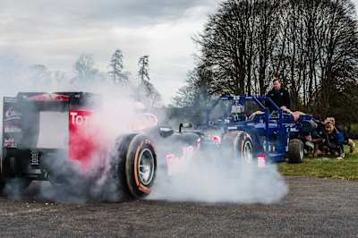 Daniel Ricciardo pits his Red Bull Racing RB8 against Bath Rugby's scrum in F1 Scrum.