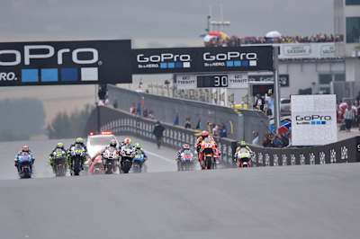 MotoGP riders fire off the grid at the start of the race in Sachsenring, Germany on July 17, 2016