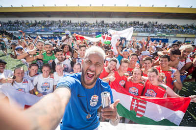Nneymar Jr poses with his fans from different nationalities.