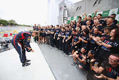 Sebastian Vettel and Infiniti Red Bull Racing staff celebrate his third world title win in Brazil 2013