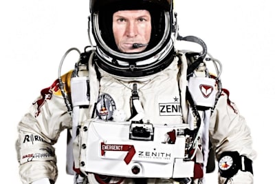 Felix poses wearing Red Bull Stratos suit