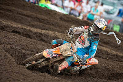 Motocross rider Ryan Dungey riding with roll-offs