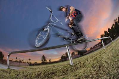 BMX rider Adam Banton does a barspin rocket icepick grind in Arizona in 2012