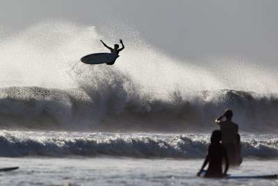 Surfing at Kuta Beach, Bali