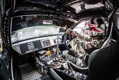 Inside Mad Mikes Madbull Mazda RX7 at Goodwood FOS