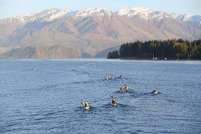 Kayakers on the River Cluth in New Zealand.