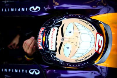 Daniel Ricciardo of Australia and Infiniti Red Bull Racing sits in his car in the garage during practice ahead of the Abu Dhabi Formula One Grand Prix