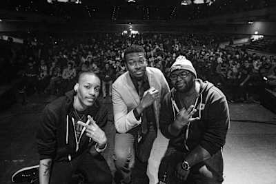 EE on the stage with D1 and TKBreezy at Genesis 3