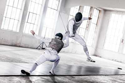 Fencer Alex Choupenitch attacks his opponent during a training session in Prague, Czech Republic