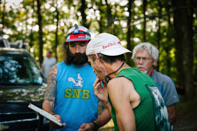 Karl Meltzer and crew check out the map