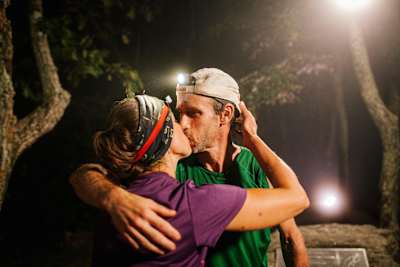 Karl Meltzer receives a kiss after breaking the record for running the length of the Appalachian Trail on 18 September, 2016.