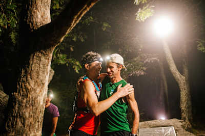 Karl Meltzer receives a hug from the previous record holder, Scott Jurek, after breaking the record for running the length of the Appalachian Trail on 18 September, 2016.