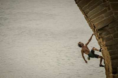 Chris Sharma free climbing in Pamplona, Spain